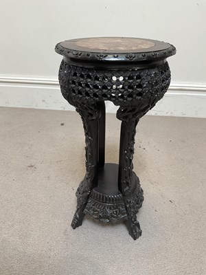 Lot 1030 - A late 19th century Chinese carved rosewood...