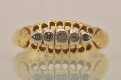 Lot 1277 - An 18ct yellow gold diamond five stone ring,...