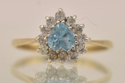 Lot 1308 - A 9ct yellow gold aquamarine and diamond set...