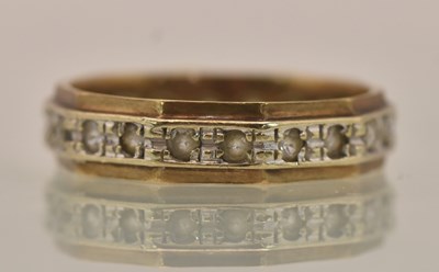 Lot 1334 - A 9ct yellow and white gold set white stone...