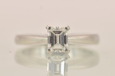 Lot 1251 - A platinum (950) diamond solitaire ring, the...