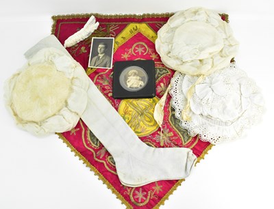 Lot 558 - Vintage textiles including children's bonnets...