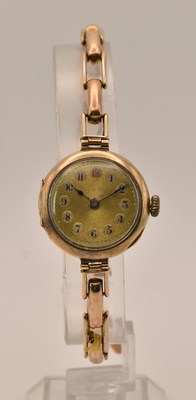 Lot 1690 - A lady's vintage 9ct rose gold wristwatch, the...