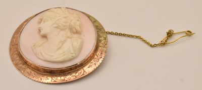 Lot 1476 - A 9ct yellow gold mounted carved cameo brooch...