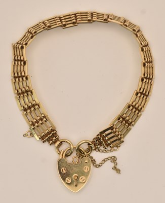 Lot 1498 - A 9ct yellow gold five bar gate link bracelet,...