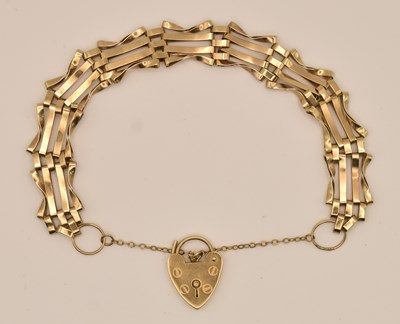 Lot 1505 - A 9ct yellow gold gate link bracelet with...