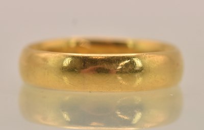 Lot 1241 - A 22ct yellow gold band ring, size M, approx 5....