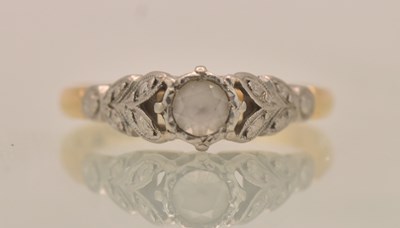 Lot 1302 - An 18ct yellow gold and platinum white stone...