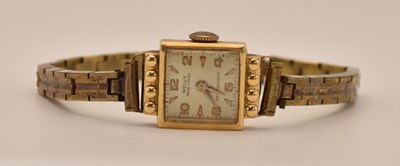 Lot 1675 - WOLUX; a vintage lady's 18ct yellow gold cased...