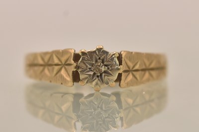 Lot 1337 - A 9ct yellow gold diamond solitaire ring, the...