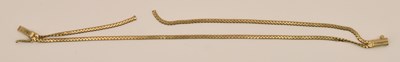 Lot 1403 - A 9ct yellow gold double strand necklace (cut),...