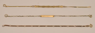 Lot 1518 - A 9ct yellow gold fine dainty link identity...