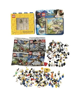 Lot 607 - LEGO; a quantity of Lego minifigures parts and...