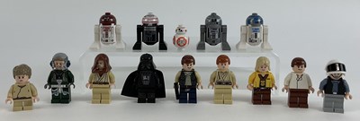 Lot 634 - LEGO; five Lego droids including an R2-D2 and...