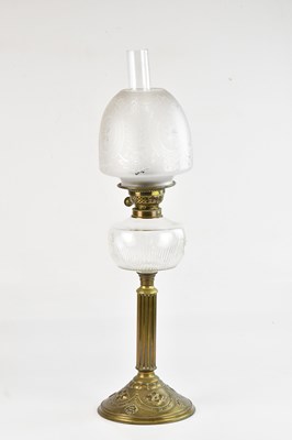 Lot 2354 - A late 19th/early 20th century oil lamp, with...