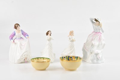 Lot 1227 - ROYAL DOULTON; a group of four figures...