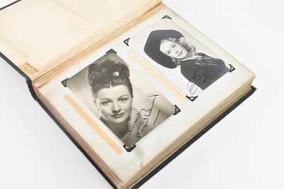 Lot 511 - An album of photographs and prints of actors...