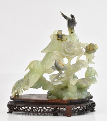 Lot 1034 - A large Chinese green hardstone model of...