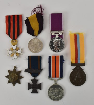 Lot 457 - Seven assorted Victorian and later military...