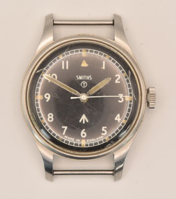 Lot 452 - SMITHS; a late 1960s military issue watch, the...