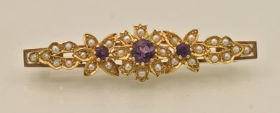 Lot 1471 - A yellow gold bar brooch, the floral set...