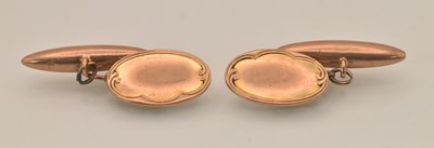 Lot 1466 - A pair of 9ct rose gold cufflinks, with oval...