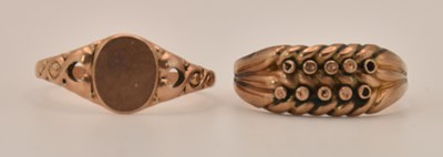 Lot 1335 - Two yellow gold rings comprising a signet ring...