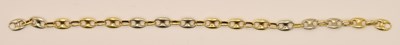 Lot 1499 - An 18ct yellow and white gold mariner link...
