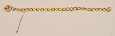 Lot 1504 - A 9ct yellow gold flat Cuban link bracelet...