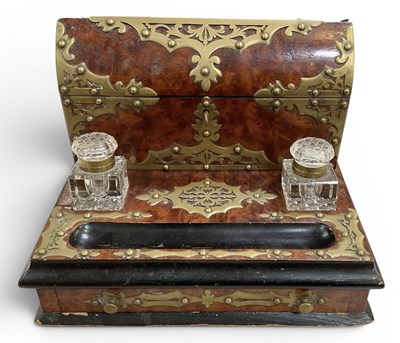 Lot 388 - A late Victorian walnut and brass bound...