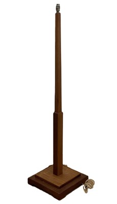 Lot 764 - An Art Deco style teak floor lamp with stepped...