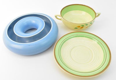 Lot 685 - CLARICE CLIFF; a two handled Art Deco style...