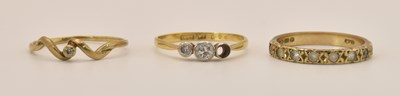 Lot 1324 - Three rings comprising an 18ct gold yellow...