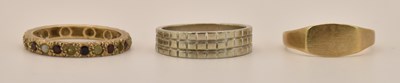 Lot 1329 - A 14ct white gold dress ring, with textured...