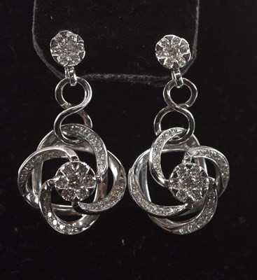 Lot 1434 - CHIMENTO; a pair of 18ct white gold diamond...