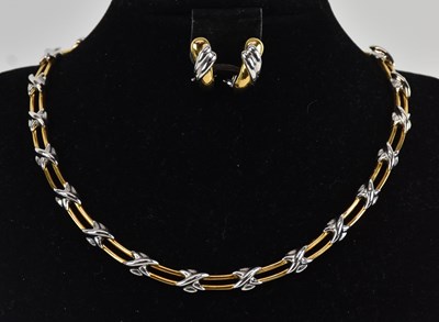 Lot 1358 - An 18ct two-tone gold necklace and earring set,...