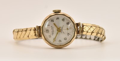 Lot 1680 - EXCALIBUR; a lady's 9ct gold wristwatch, the...
