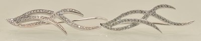 Lot 1460 - A pair of diamond encrusted white metal...