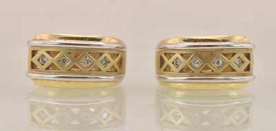 Lot 1439 - A pair of two-tone 14ct gold hoop earrings,...