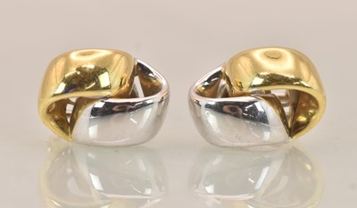 Lot 1437 - A pair of 18ct two-tone gold earrings...