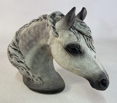 Lot 20 - A composite cement and plaster sculpture of...