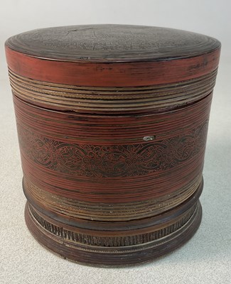 Lot 132 - A red and black lacquered, hand painted betel...
