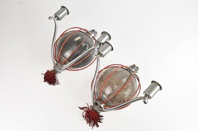 Lot 1405 - A pair of chrome and red painted convex wall...