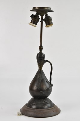Lot 2351 - An early 20th century bronzed ewer effect...