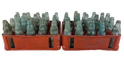 Lot 113 - A large collection of Codd neck glass bottles,...