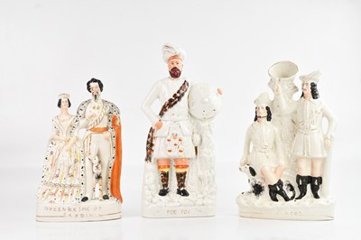 Lot 1269 - Three 19th century Staffordshire figures...