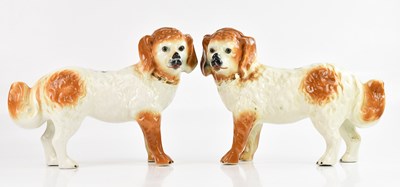 Lot 1264 - A pair of 19th century Staffordshire standing...