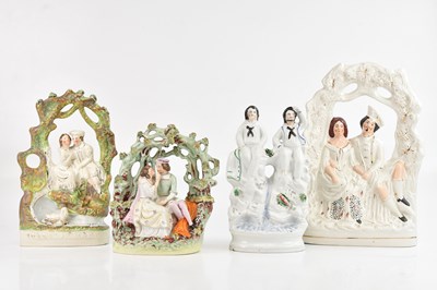 Lot 1271 - A group of four Staffordshire figures...