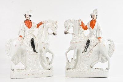Lot 1272 - A pair of Staffordshire figures on horseback,...