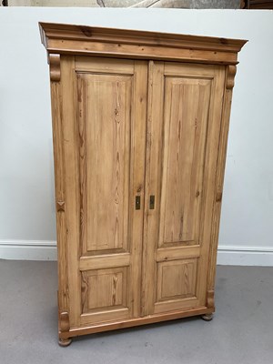 Lot 54 - A Continental pine armoire, height 202cm,...